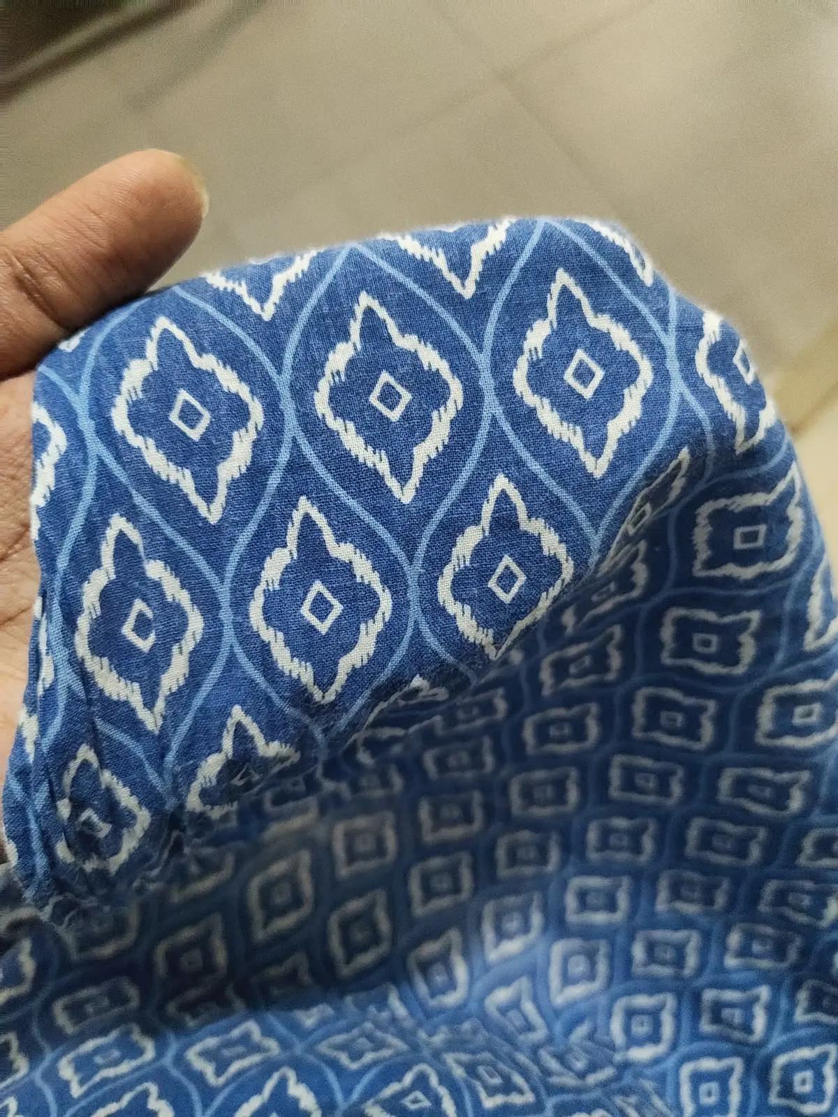 The ikat-inspired print on fabric