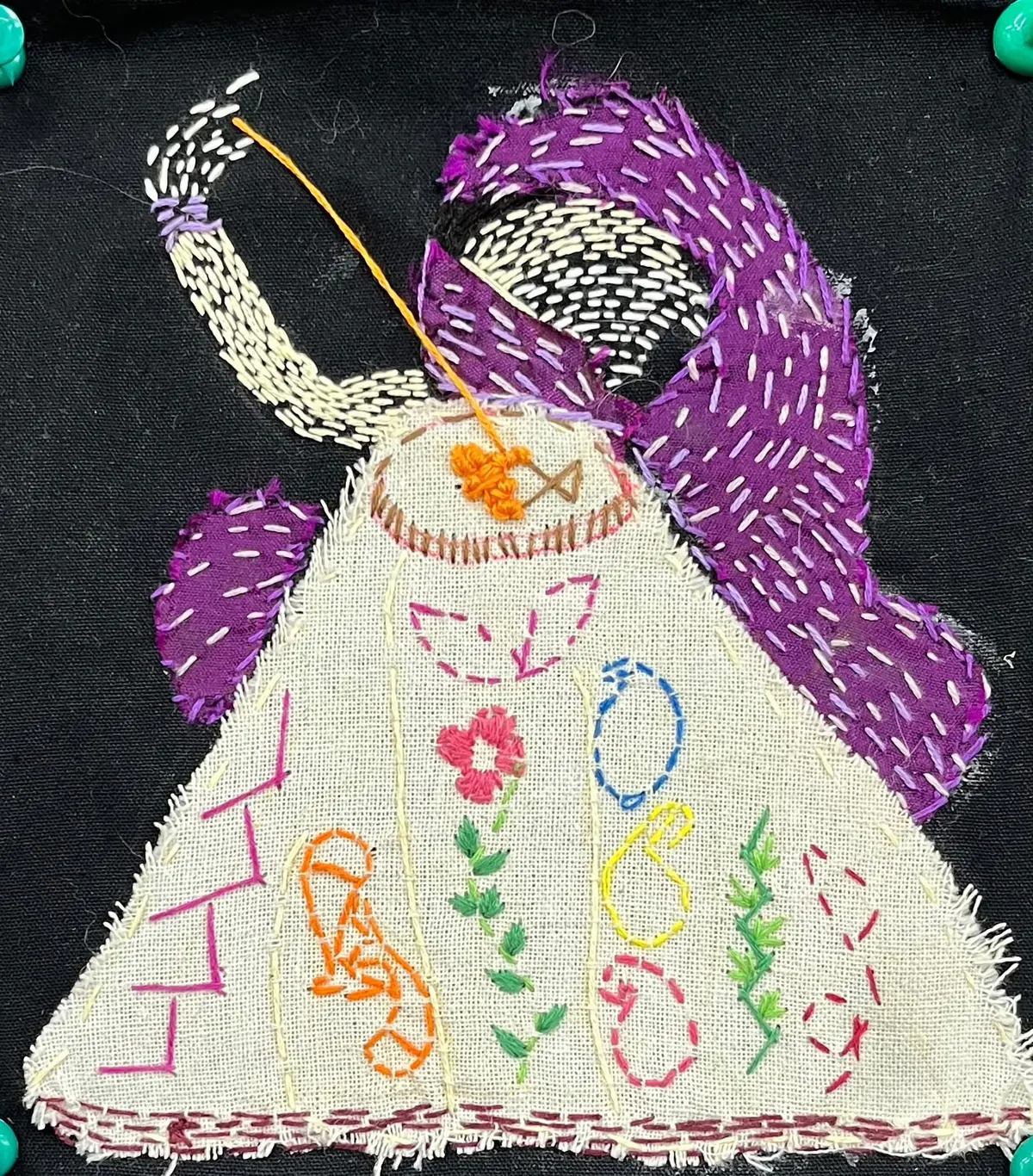 Kantha embroidery sample: a woman in a running-stitch sari