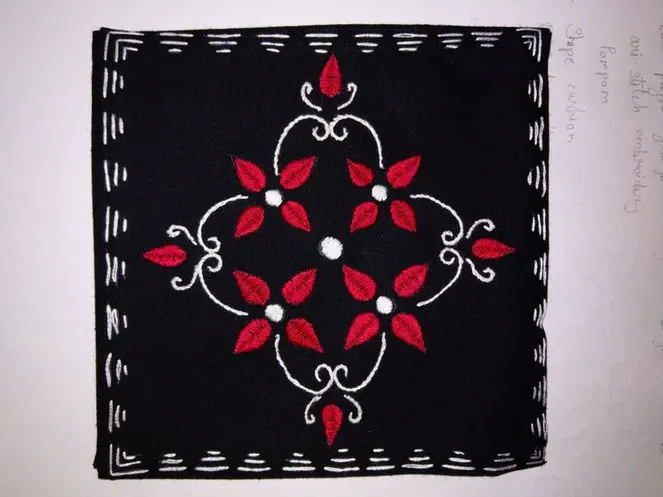 Manipuri embroidery sample in red on black