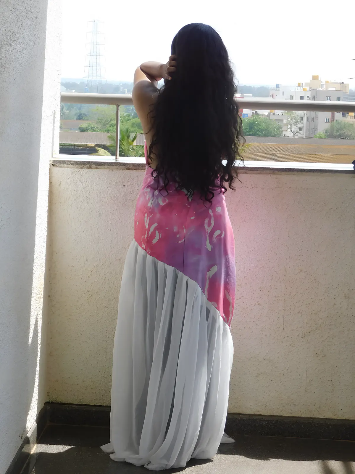 The full length of the gown with its white skirt