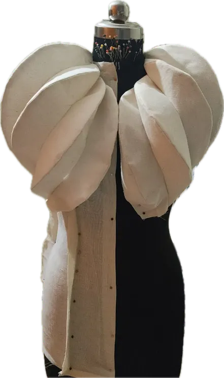 Erosion: shell shoulders on the dress form