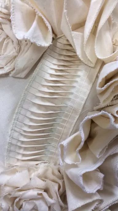 Pin tucks sample with ruffled edge